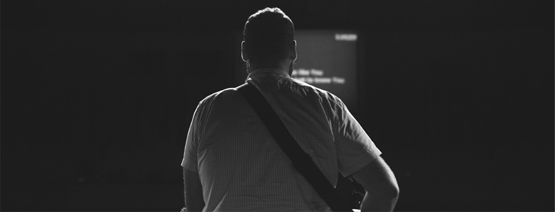 player in front of empty stage